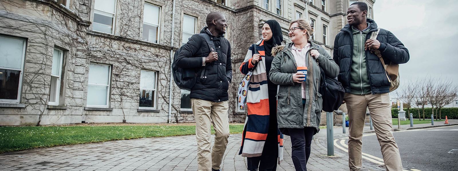 Mary Immaculate College postgraduate students outside the Foundation building at MIC