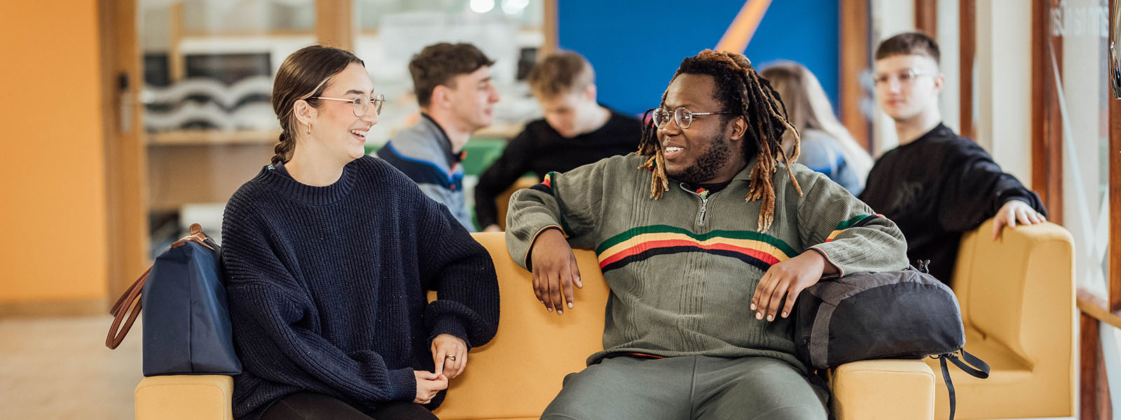 Bachelor of Arts students in the Arts lounge area.