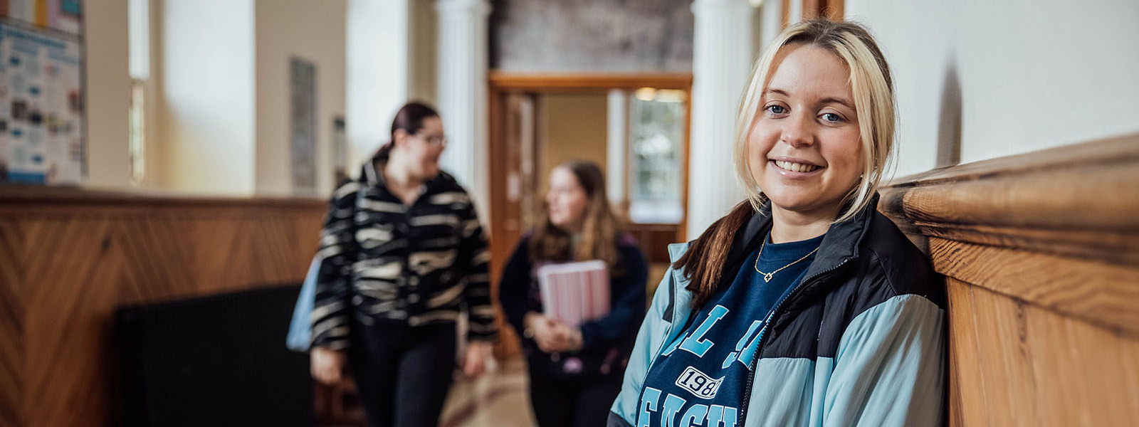 Undergraduate student in hallway of MIC Thurles.