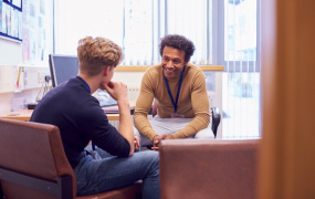 Two men talking