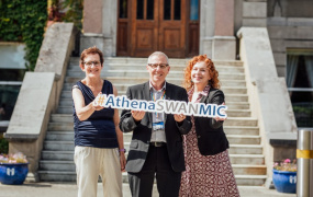 Dr Joan O'Sullivan, Professor Bill Leahy and Dr Deirdre Flynn holding an Athena Swan sign