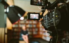 Video camera in front of interview subject