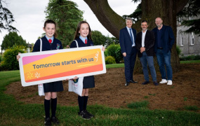 Two local primary school students with Dr Finn Ó Murchu, Dr Niall Muldoon and Professor Philip Jaffé