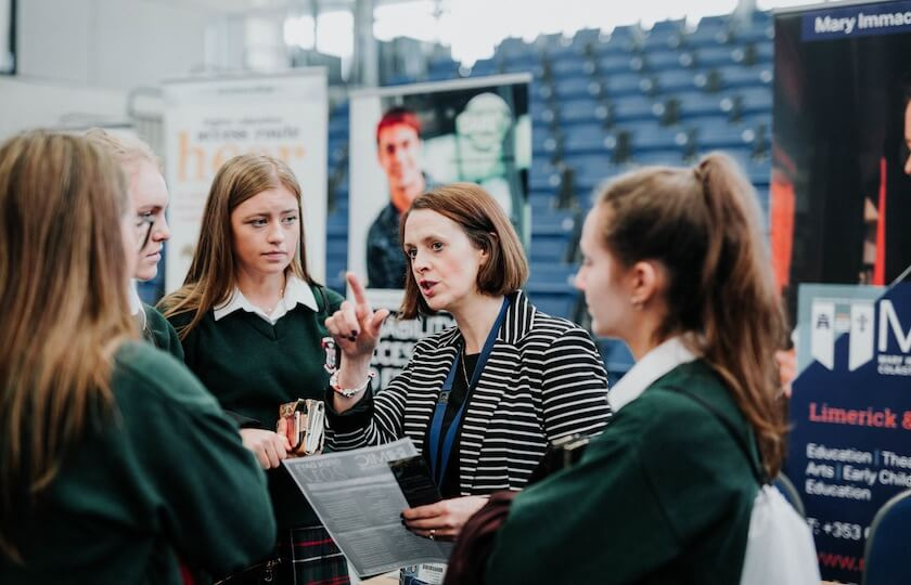 Lilian Monahan from the MIC Admissions Office talking to secondary school students at MIC Open Day