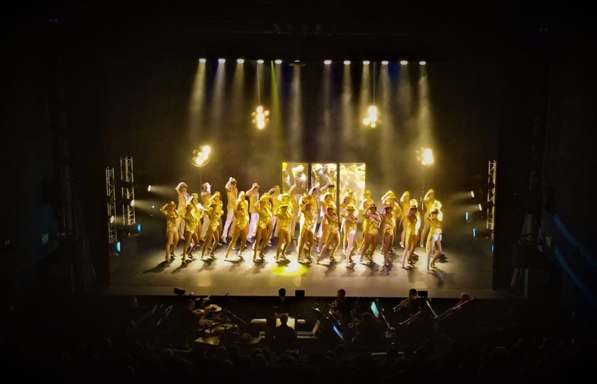 Members of MIDAS, MIC's Dramatic Arts Society, performing 'A Chorus Line' on stage at the Lime Tree Theatre