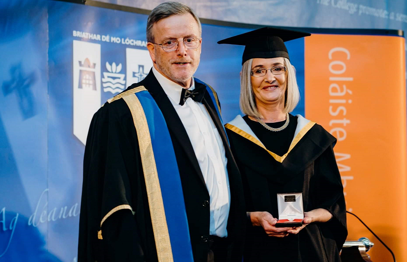 Geraldine Brassil pictured with Professor Eugene Wall, President of MIC