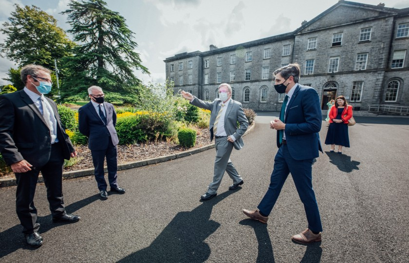 Professor Eugene Wall introduces Minister Harris to staff