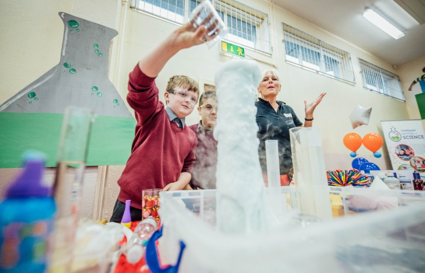 Primary school student participating in science experiment