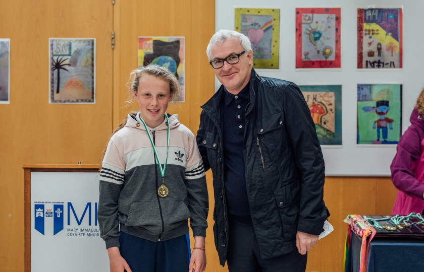 Le Chéile's captain and Player of the Match, Kelsey O'Shea, with Professor Gary O'Brien