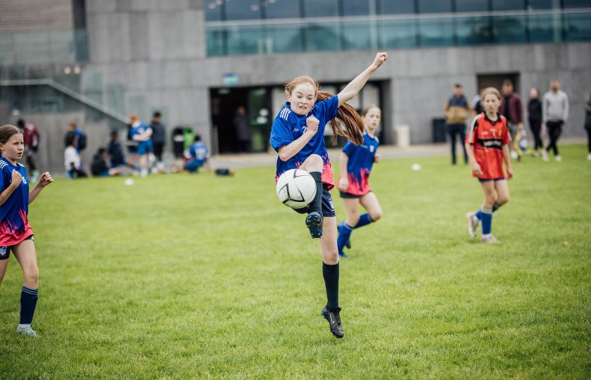 League of Legends participants Isabelle jumps for the ball