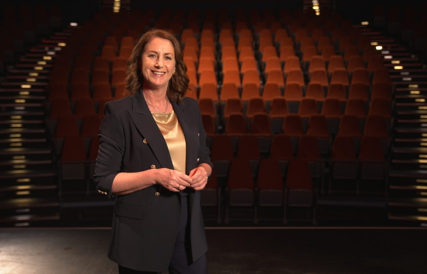 Katie Hannon pictured standing in front of the seats in the Lime Tree Theatre