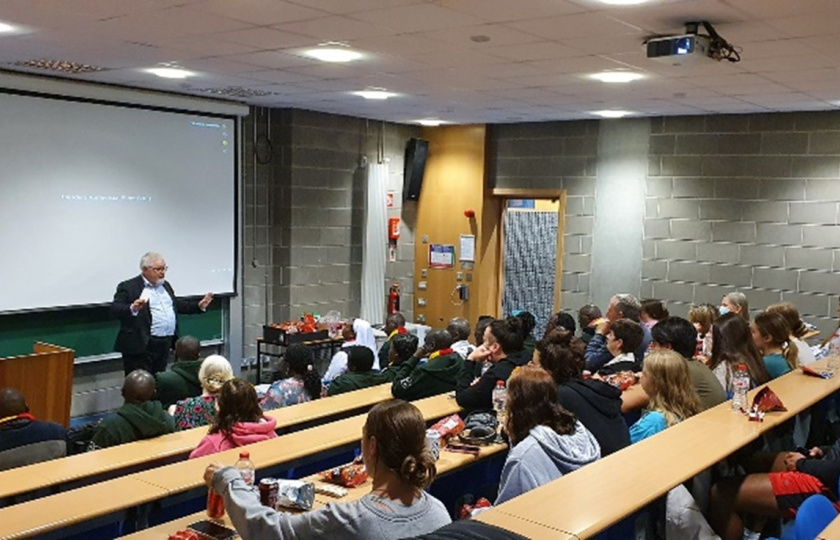 Éamonn Gaines offering an introduction to the documentary Young Plato during Philosophy Movie Night