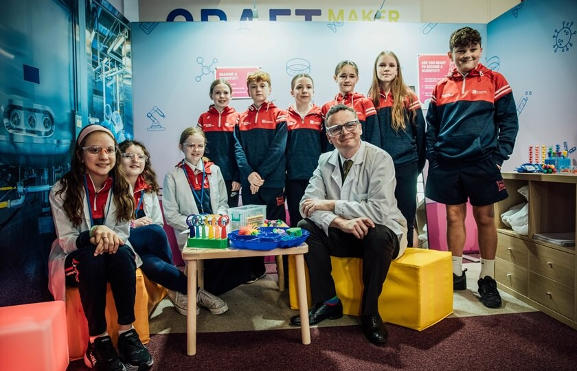 Minister for Further and Higher Education, Research, Innovation and Science, Patrick O’Donovan TD with pupils from An Mhodhscoil Limerick at the launch of the Regeneron Future Scientist Exhibition in Mary Immaculate College