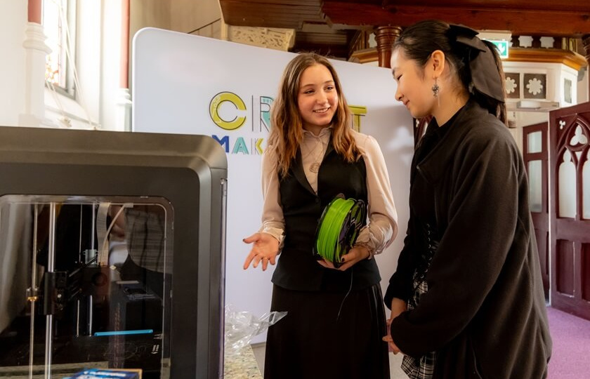  8th Tipperary Science Week two adult females looking at a 3D printer